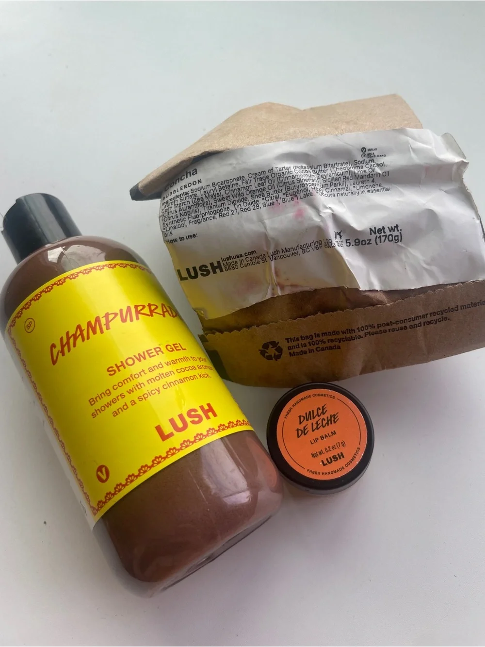 LUSH Yellow Champurrado Shower Gel & Dulce de Leche Lip Balm - Concha Bath Bom